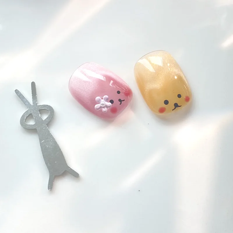 TSZS 1 stks schattig konijn vormige cat eye magneet gevouwen multifunctionele y-vorm cat eye nagel magneet manicure tool
