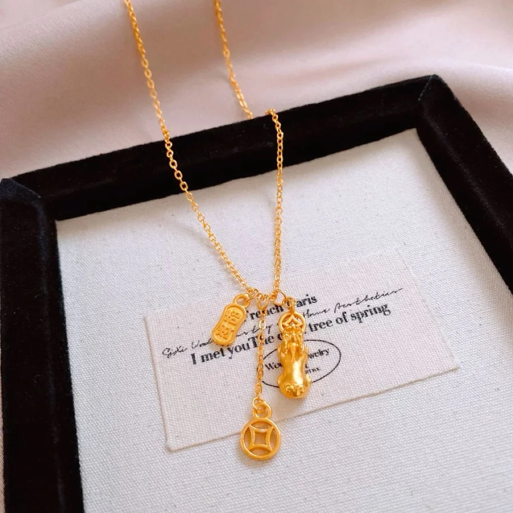 

Women's Pixiu Tassel Necklace, 24K Gold, AU999 | "Stability" engraving with scale motifs, subtle professional elegance.