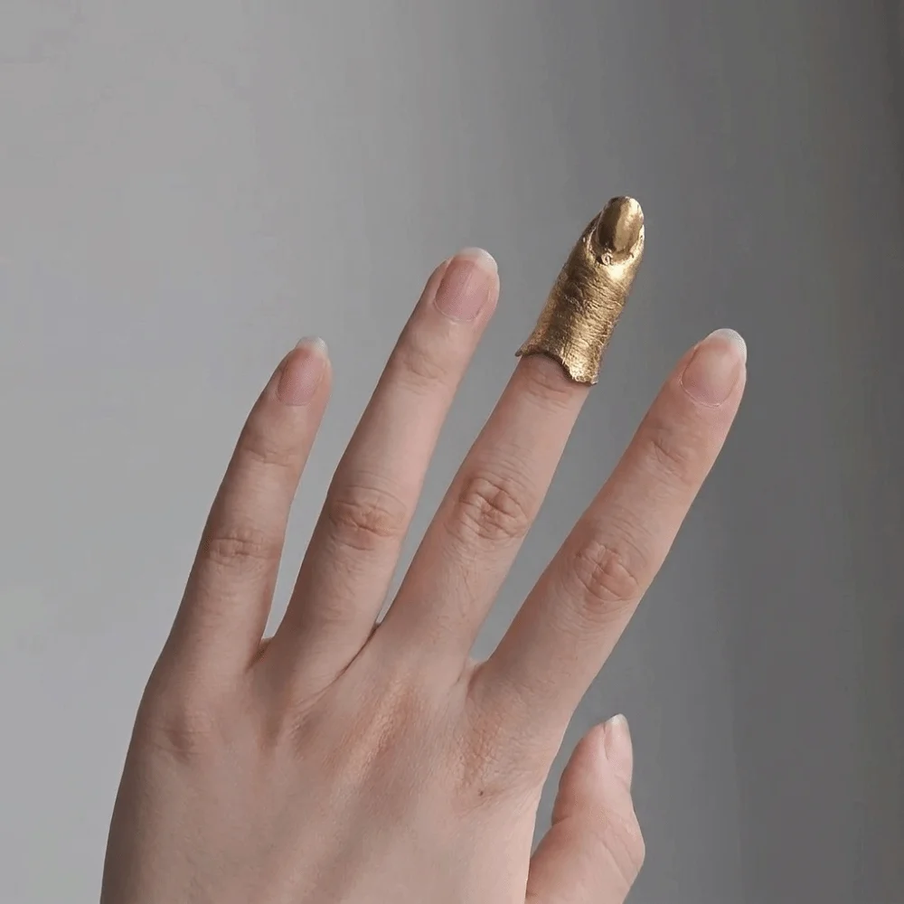 Creative Irregular Texture Lava Drop Ring Vintage Alloy Nail Sleeve Niche Design Bowknot Armor Ring Vacation