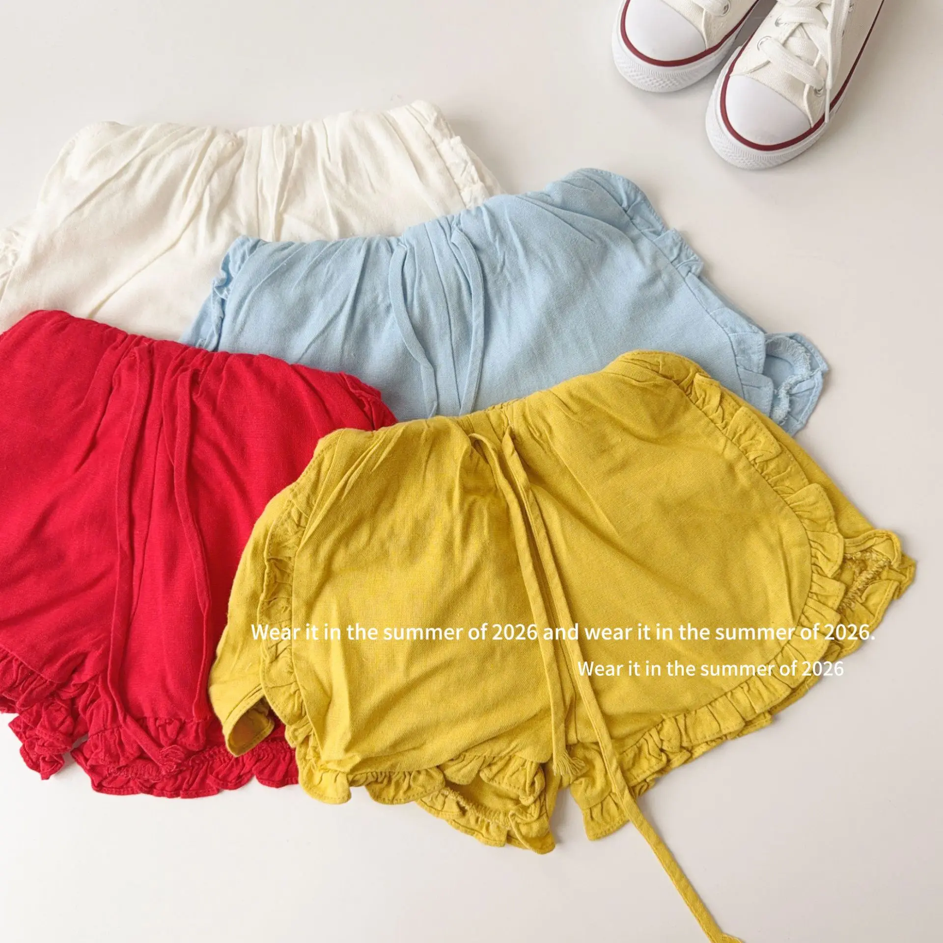 calcas-infantis-femininas-2026-primavera-e-verao-nova-colecao-roupa-infantil-estilo-coreano-menina-bebe-cor-solida-com-detalhe-de-orelha-de-madeira-lateral-shorts-casuais