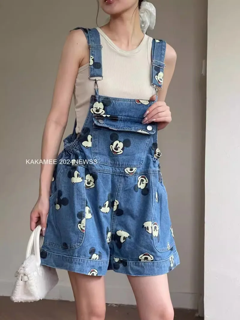 Baju terusan Denim gambar kartun muda wanita, Jumpsuit Denim motif penuh, celana pendek Jeans kasual longgar gaya Amerika baru musim panas 2024