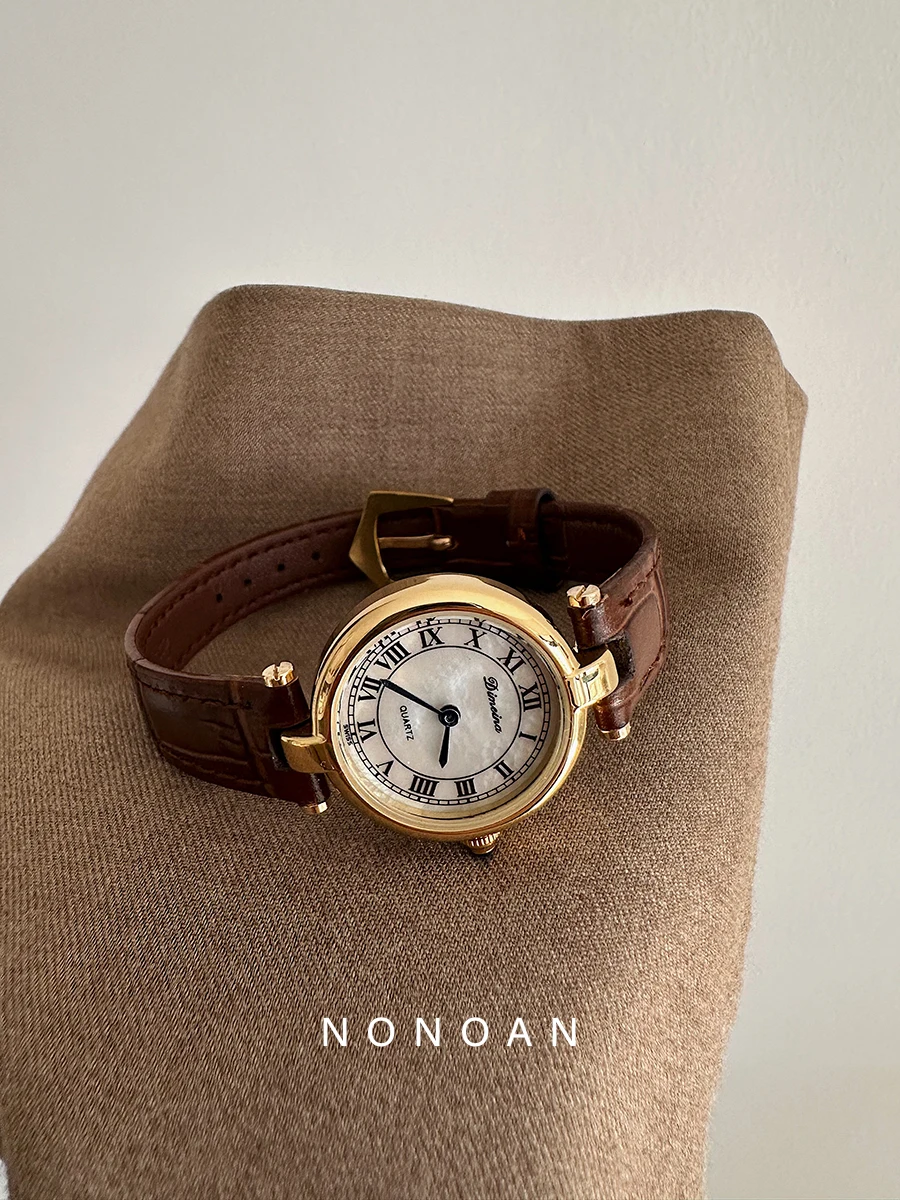 Classico retrò rotondo romano quadrante piccolo quadrante in madreperla temperamento alla moda cinturino in pelle di lusso orologio al quarzo regalo da donna
