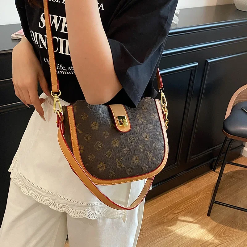 

2025 New! Light Luxury Women's Saddle Bag - Retro Print Niche Design | Fashion-Forward Shoulder Bag for Trendy Styles