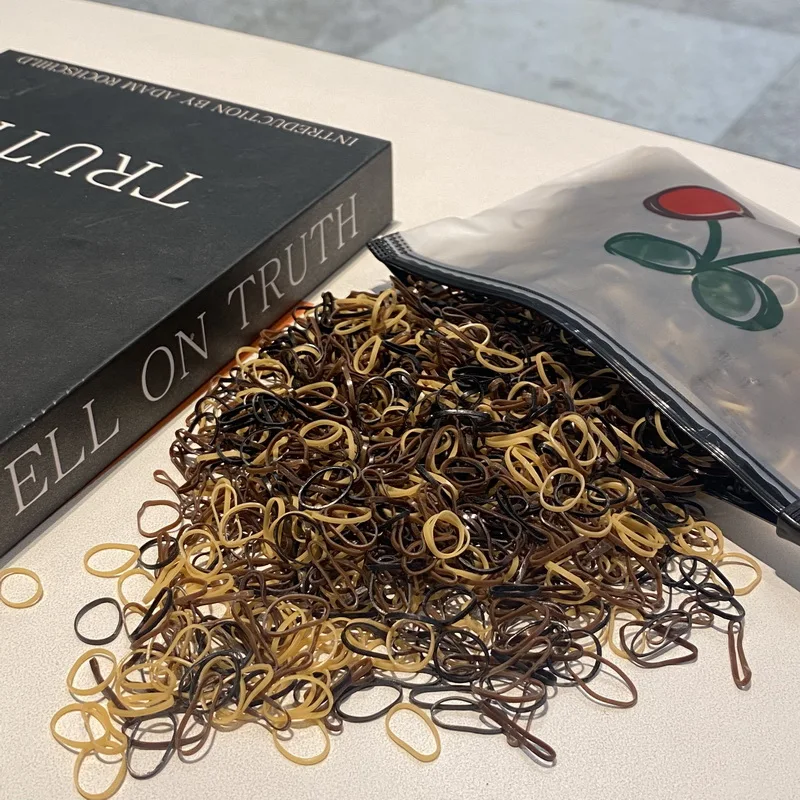 2000 pz/lotto piccoli elastici per capelli trasparenti usa e getta per bambini elastici per bracciali fascia per capelli Mini corda per capelli per
