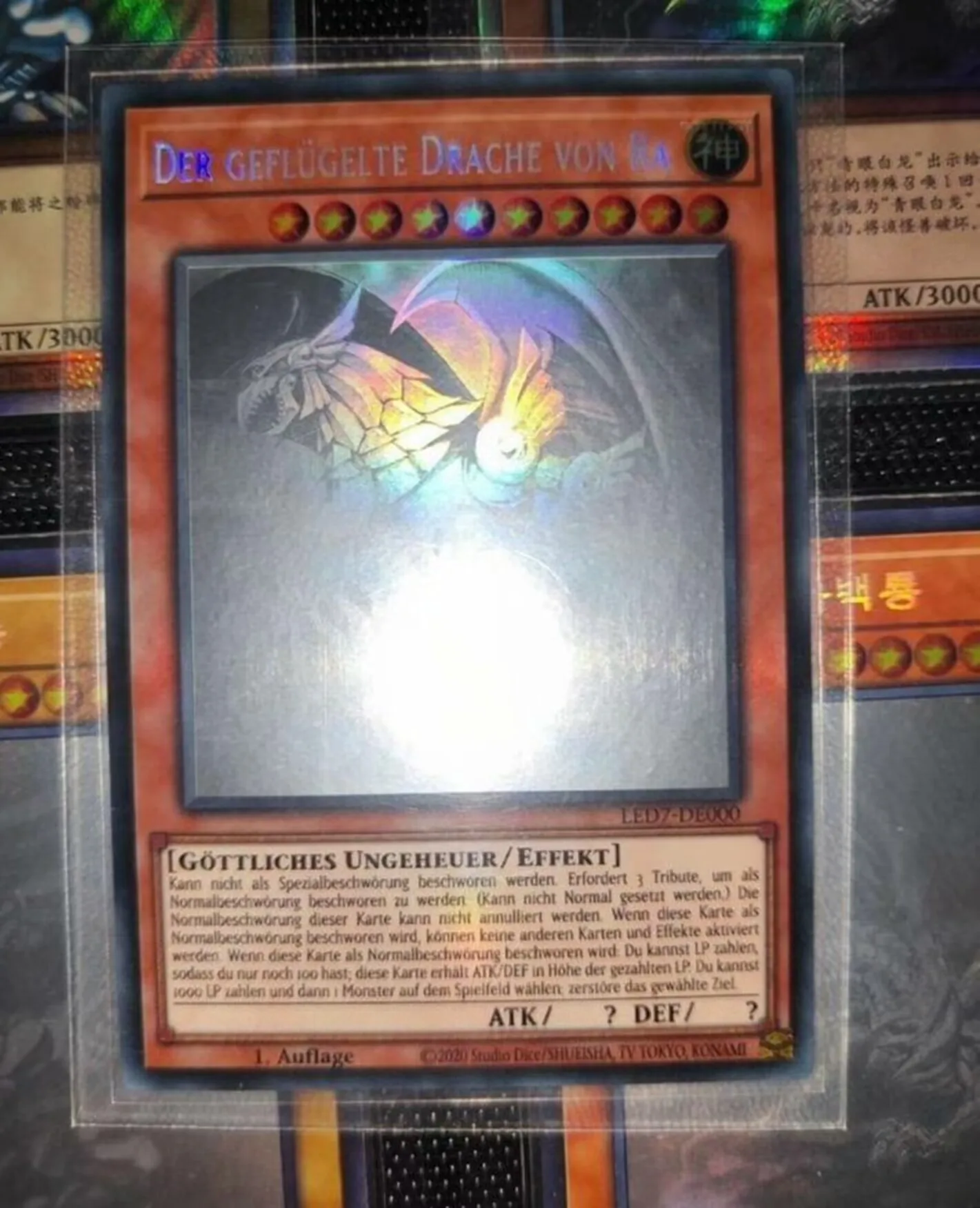 

Yugioh KONAMI Duel Monsters LED7-EN000 The Winged Dragon of Ra Ghost Rare Holographic English 1st Edition Collection Mint Card