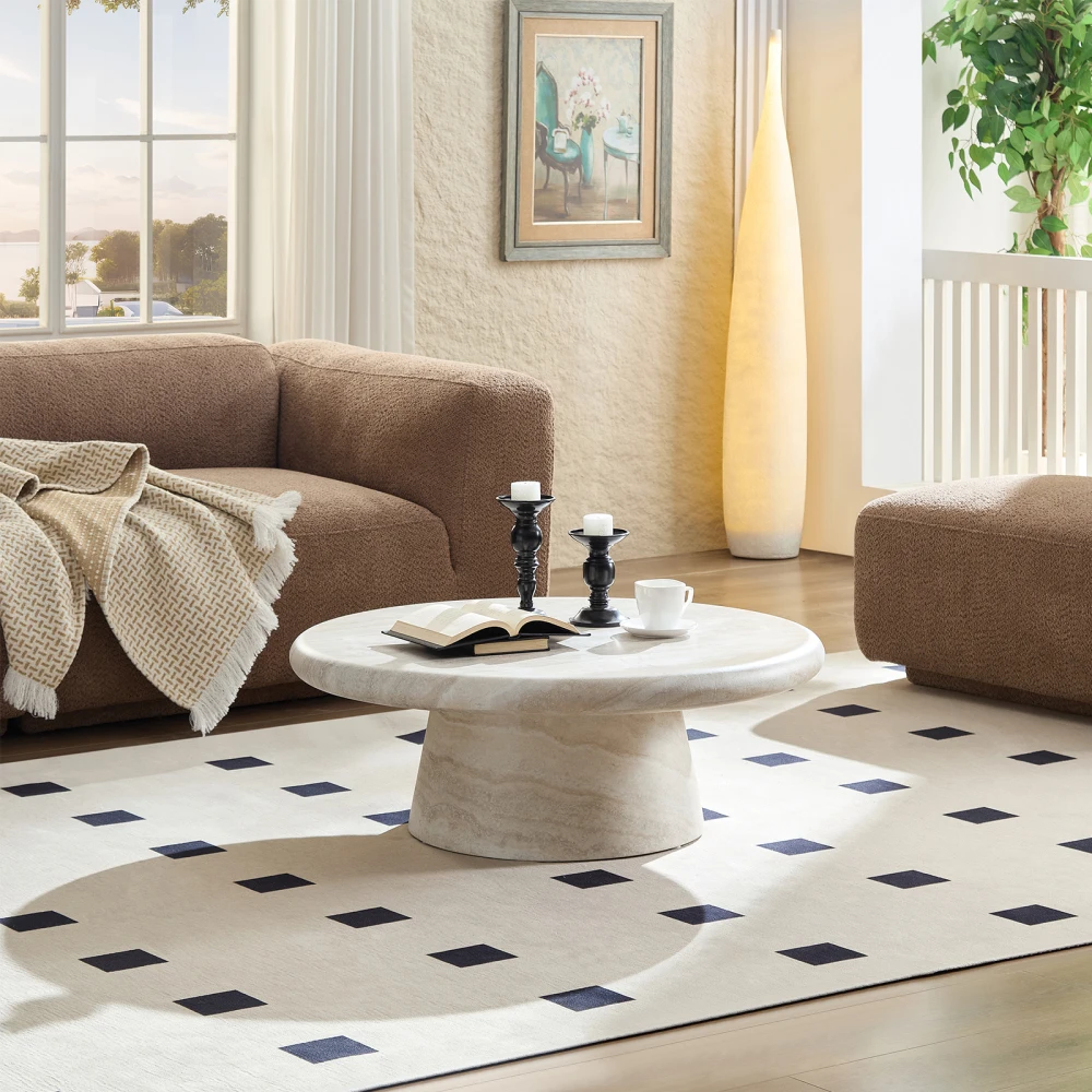 This Modern Round Coffee Table Boasts A Smooth, Marble-like Texture. Sturdy and With A Sophisticated, Understated Matte Finish, It's Versatile and Practical, Making It Perfect for Living Room Décor and Elevating The Space's Refined Style.