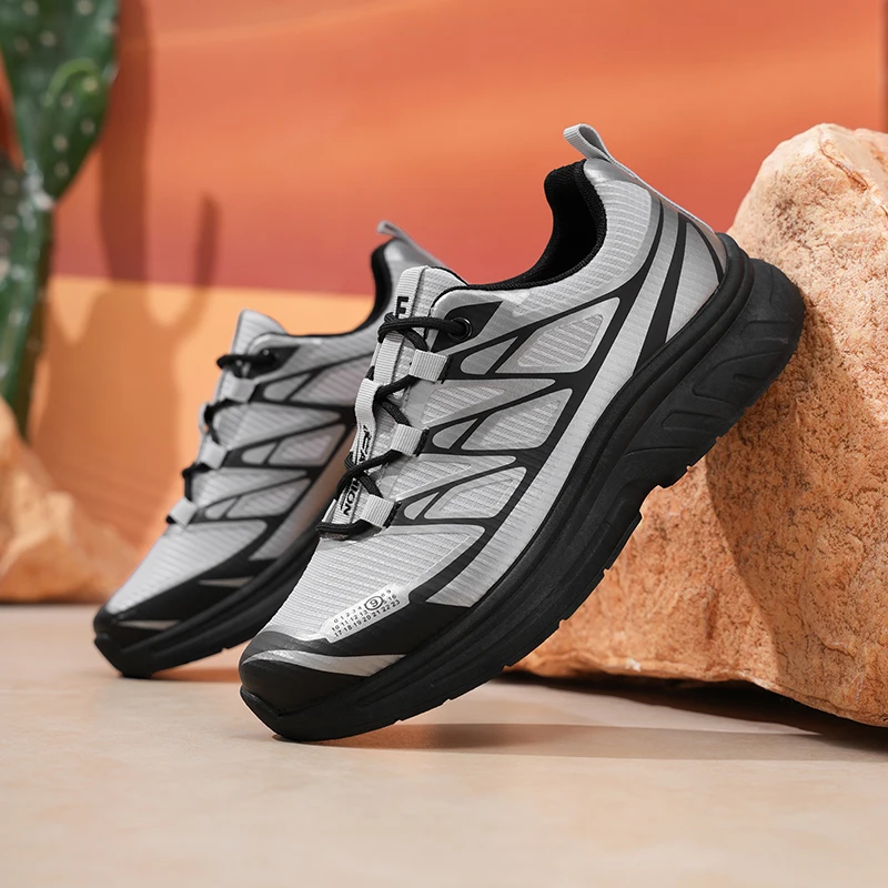 A pair of versatile all-season outdoor casual shoes for men; lightweight men's running shoes
