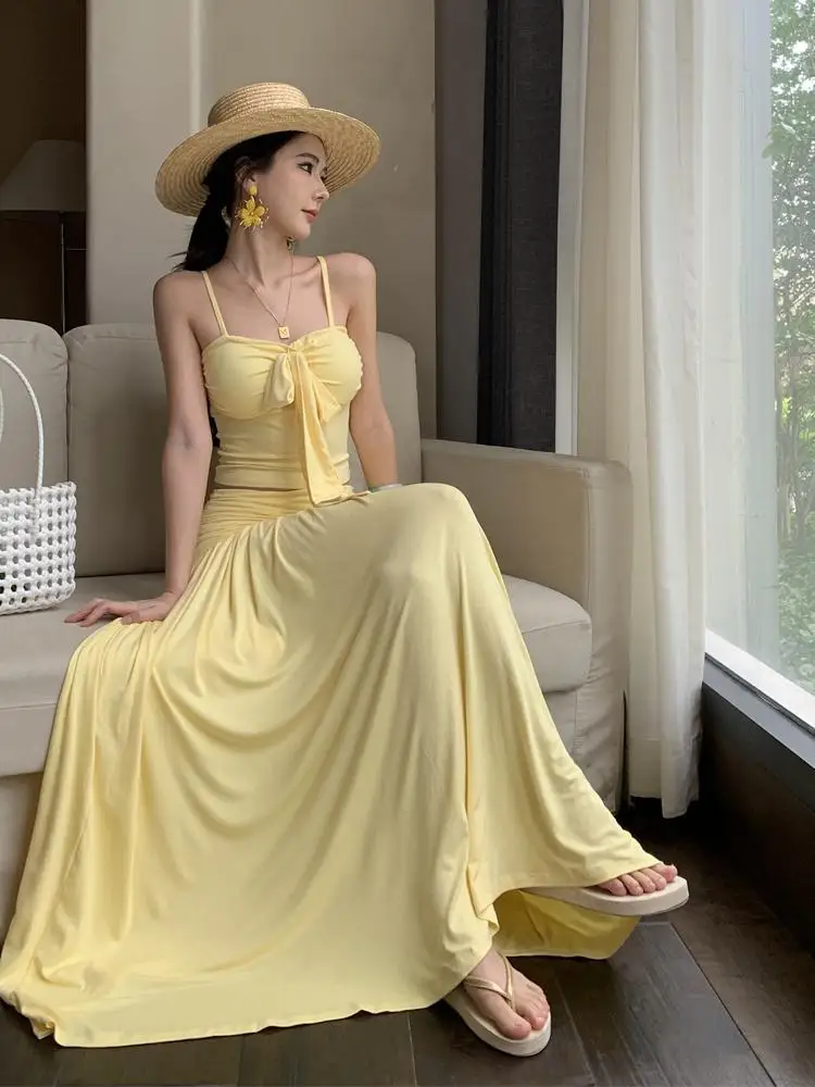 

Summer Women's Yellow Elegant Sexy Backless Bow Lace-up Short Slip Tops And High Waist Pleated Long Skirt Holiday Two-piece Sets