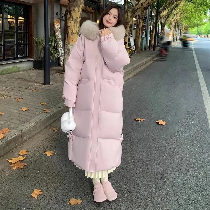 Winterjas Warme bontkraag Capuchon Dames Parka Mode Ritszakken Ontwerp Lange jas Elegante slanke dikke vrouwelijke jassen