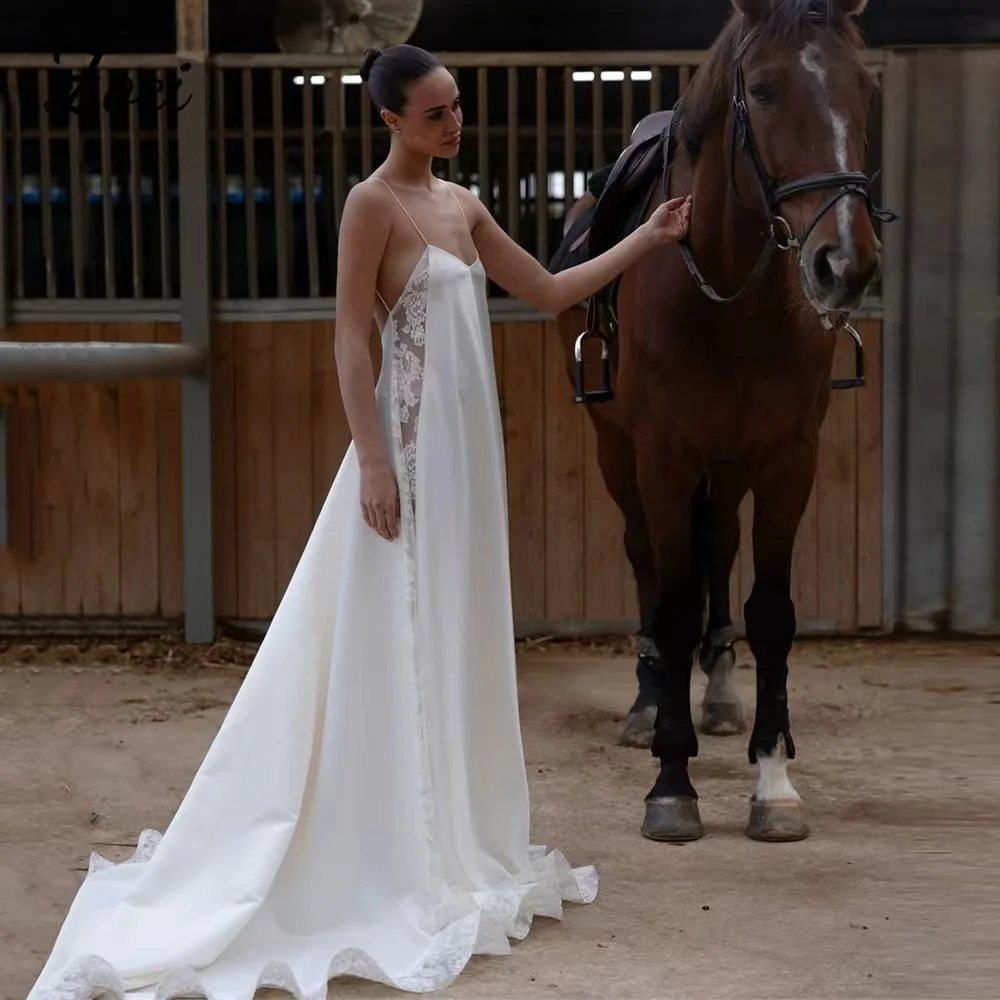 Suknie ślubne w stylu boho na plażę, seksowne, szyte na miarę, na ramiączkach spaghetti, z koronkowymi aplikacjami, suknie ślubne w kształcie litery A, gorsetowe.
