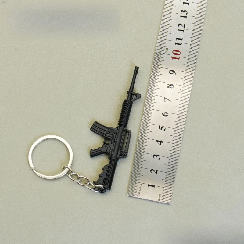 9cm/3.54in Peace Game peripheral Mini Gun Keychain M4A1 Barrett Metal Gun Weapon Model Backpack charm Fine Crafts Boys Gift Toys
