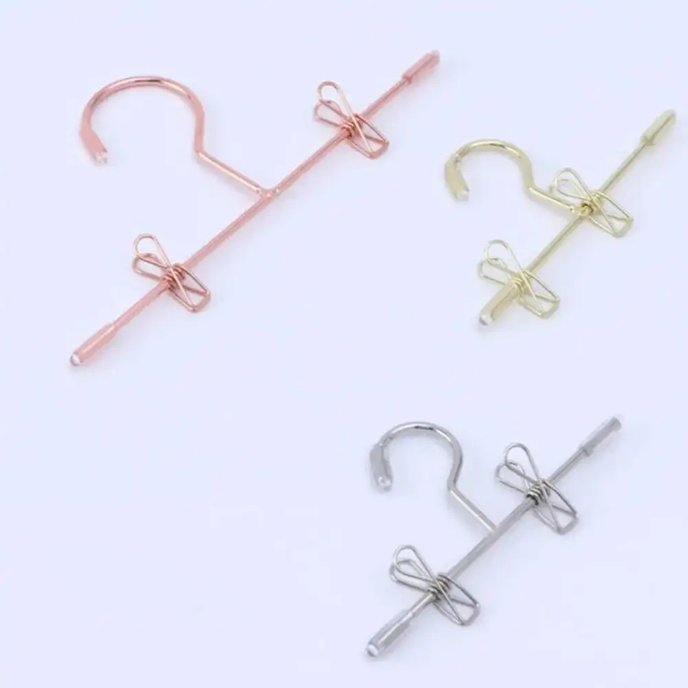 

5 шт., мини-металлическая кукла, многофункциональные носки, крючок, зажим для одежды, вешалка для брюк