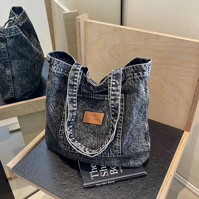 2024 nuova borsa a tracolla da donna con filo per cucire con bottone magnetico in Denim di alta qualità moda retrò borsa leggera di personalità