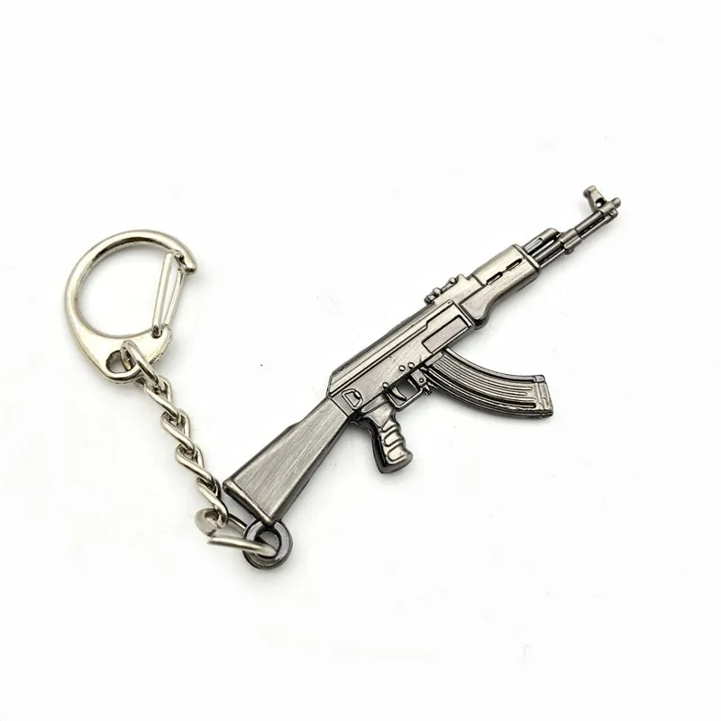 Novelty Counter Strike Gun Keychain Men Trinket M4A1 AK47 Rifle Sniper Awp CS GO Saber Men\'s Bag Car Key Chain Jewelry Souvenirs