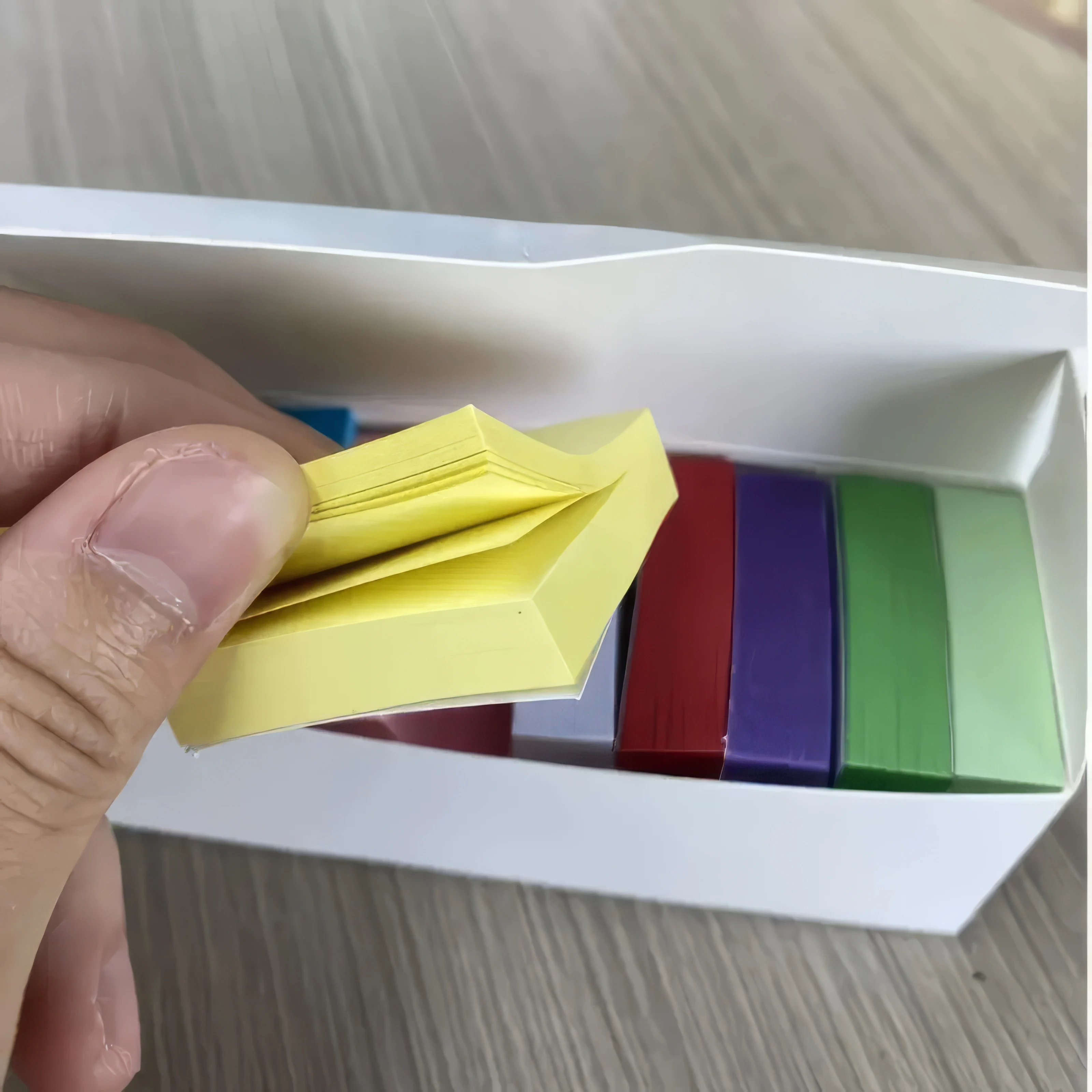

These colorful sticky notes, neatly packed in a white box, are perfect for organizing your work, study, and daily tasks.