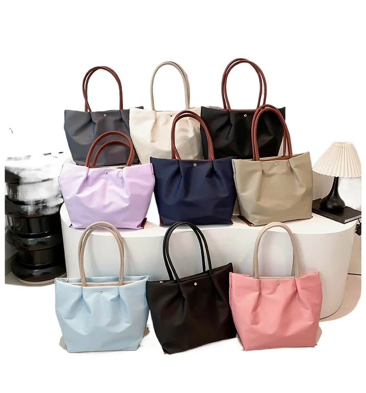 

Compact new-style tablet computer carrying bag - large capacity for outdoor storage - simple and casual pleated single-shoulder