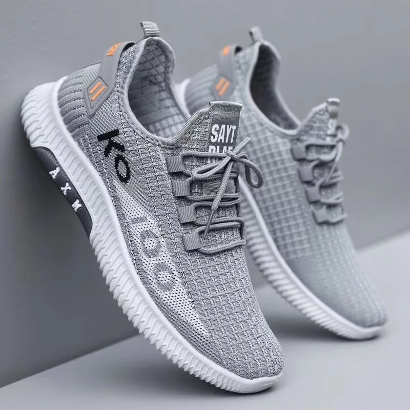 Veelzijdige nieuwe modieuze herenschoenen met ademende sportloopschoenen van mesh en casual herenschoenen