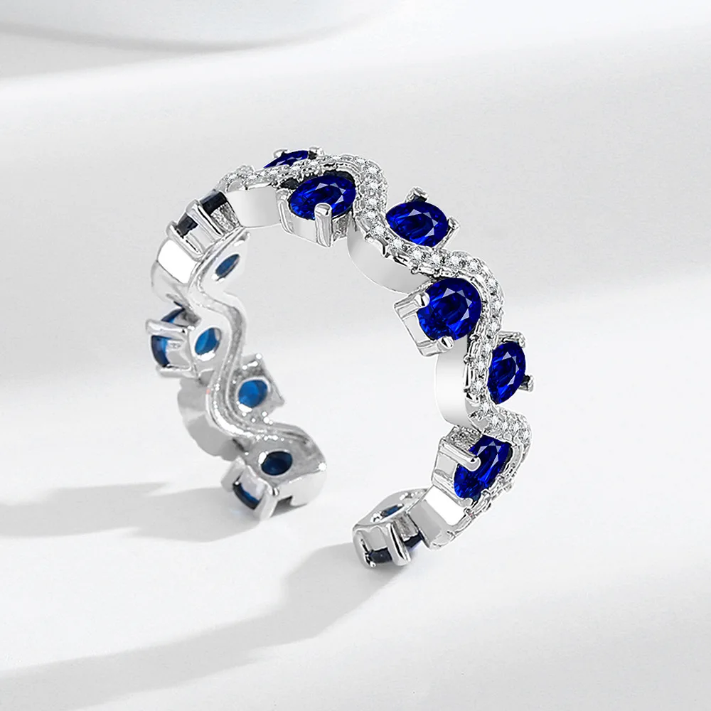 ضوء الموضة الفاخرة الأزرق الإسبنيل الزركون مطعمة مع 925 فضة تصميم موجة نمط حلقة الغلاف الجوي الراقية مجوهرات