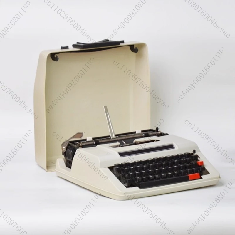 Typewriter beige English machinery normal use retro old things
