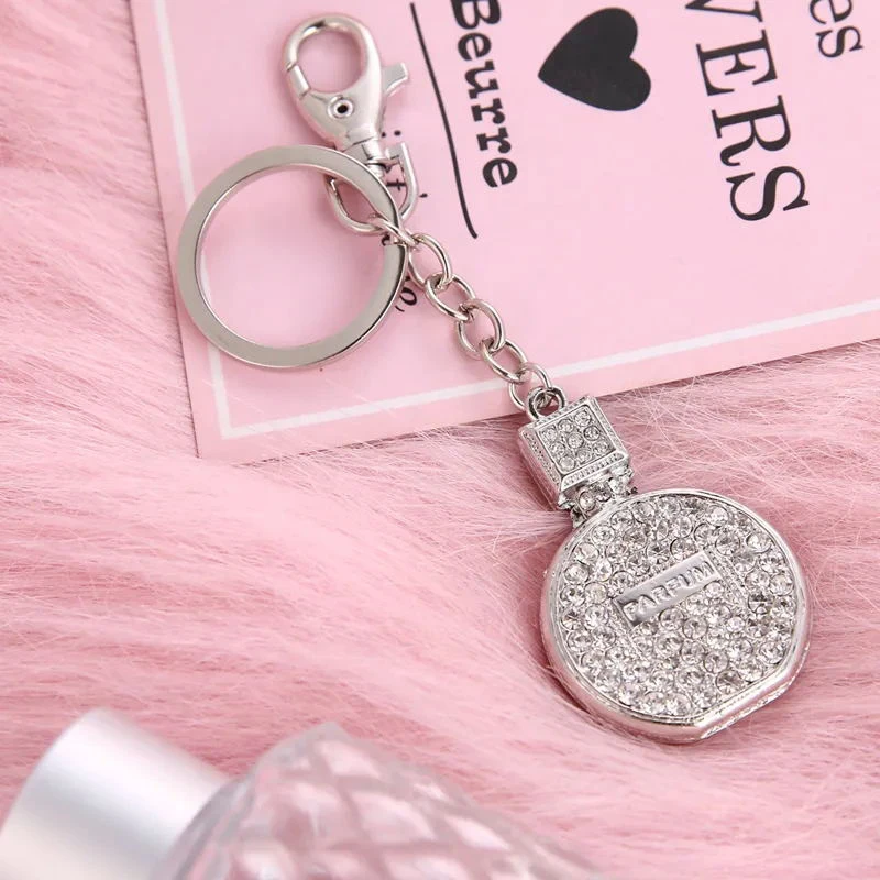 2021 spring fashion new metal rhinestone round perfume bottle crystal gemstone bag wallet keychain birthday party gift