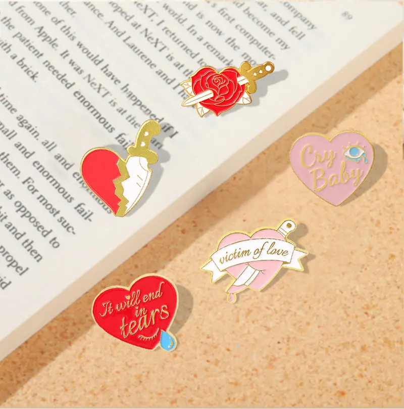 

Victim of Love Enamel Pins Custom Cry Baby Heart Rose Dagger Tears Brooches Lapel Badge Pink Red Cartoon Jewelry For Friends