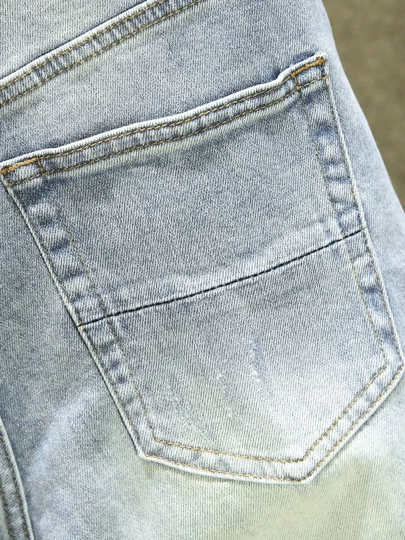 Jesienne i wiosenne modne jeansy męskie w jednolitym kolorze w stylu retro, z podarte prostymi nogawkami, wygodne, elastyczne, wysokiej jakości spodnie