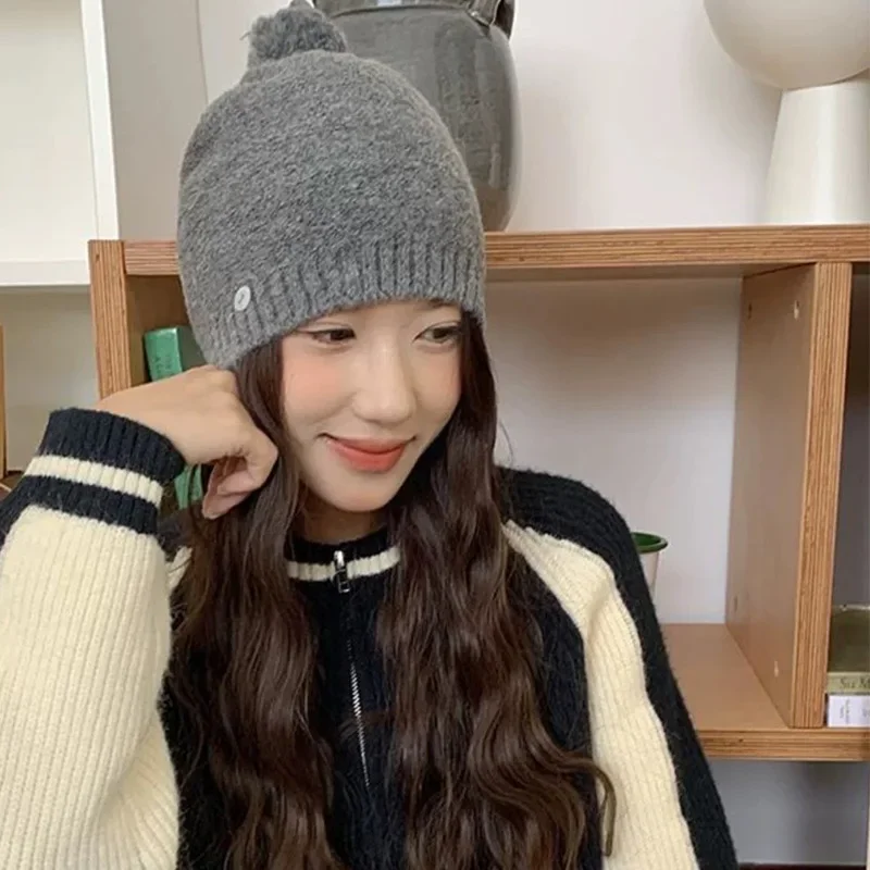 Winter Atmosphere Niche Simple Solid Color Knitted Hats for Women Outdoor Leisure Warm Versatile Cute Pom-pom Beanies Cap image 3
