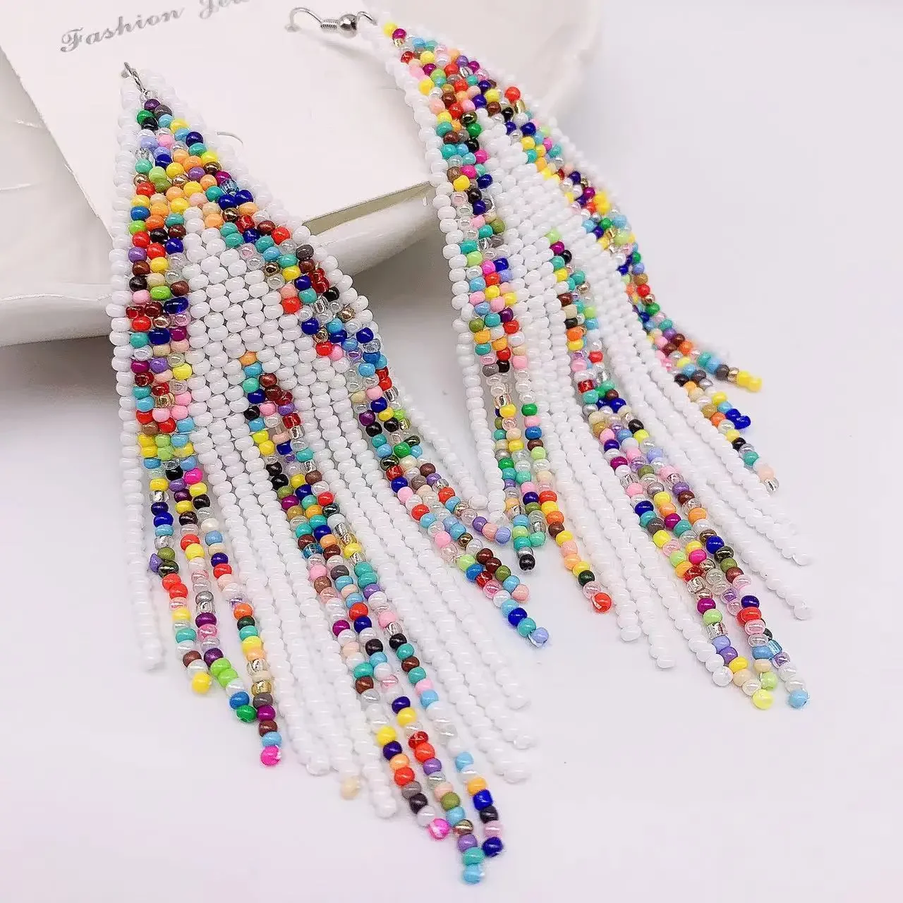 

Rice Bead Earrings Hand knitting fashion personality Beaded Simple Bohemia alloy geometry ma'am Fringe Earrings