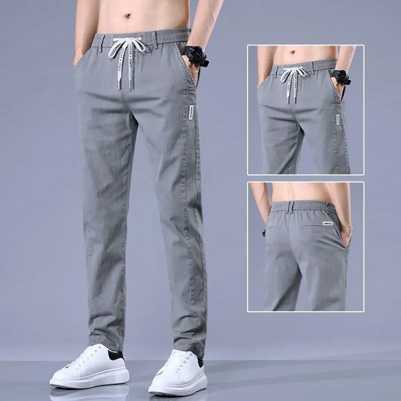 Pantaloni dritti solidi da uomo casual moda primavera autunno streetwear abiti maschili denim pantaloni sportivi larghi in vita elastica JJ593