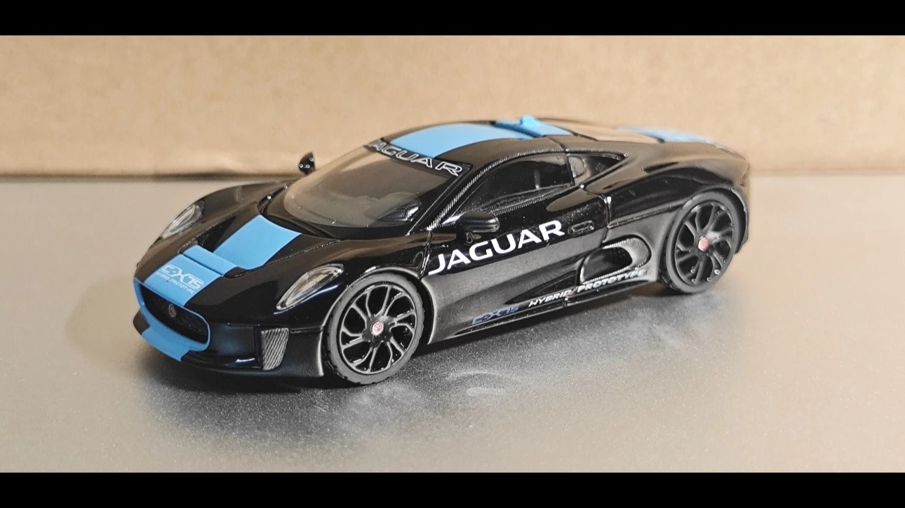 MINIGT 1:64 Scale 1070 Jaguar C-X75 Model Car in Black with Blue Stripes, Blister-Packaged, Die-Cast Alloy