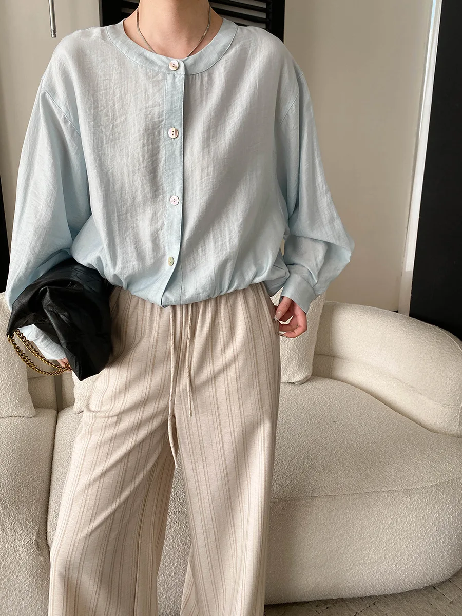 

Spring and summer women's casual solid color lightweight breathable sun protection round neck loose long sleeved shirt