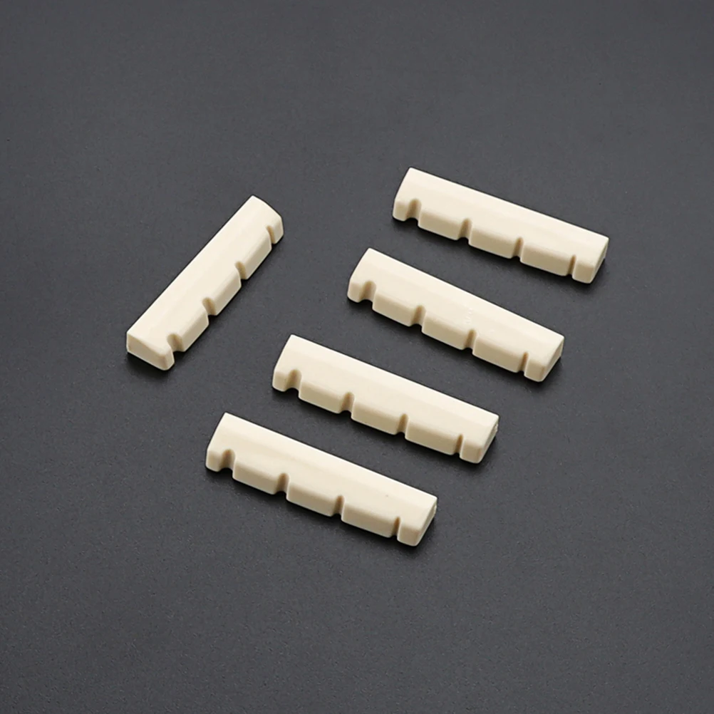 

5 Pcs Four Strings On Pillow Guitar Nut Beige Slotted Bass Accessories Bridge Nuts Durable Lightweight Wear Resistant Premium