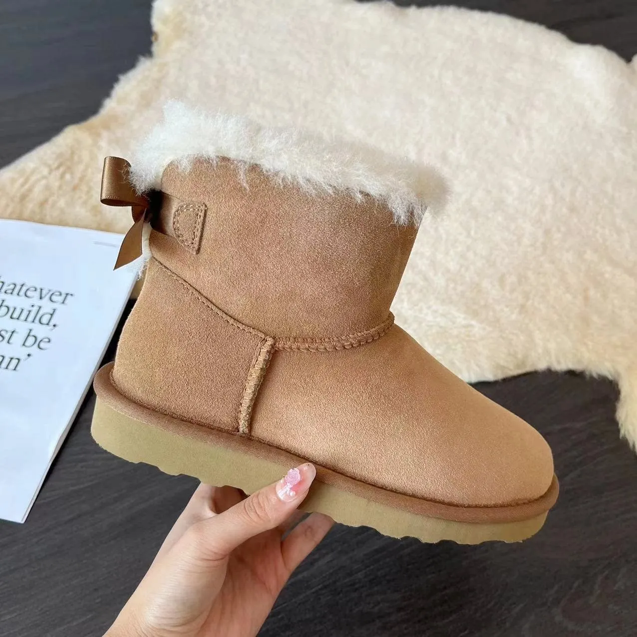 Low end ribbon style 2026 new warm women's snow boots, genuine leather cotton boots, sheep fur integrated short tube snow boots