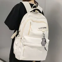 Mochila universitaria impermeable de alta capacidad para hombre y mujer, bolso escolar para niña y niño, bolsa para ordenador portátil para estudiante, bolsas para libros de viaje femeninas a la moda