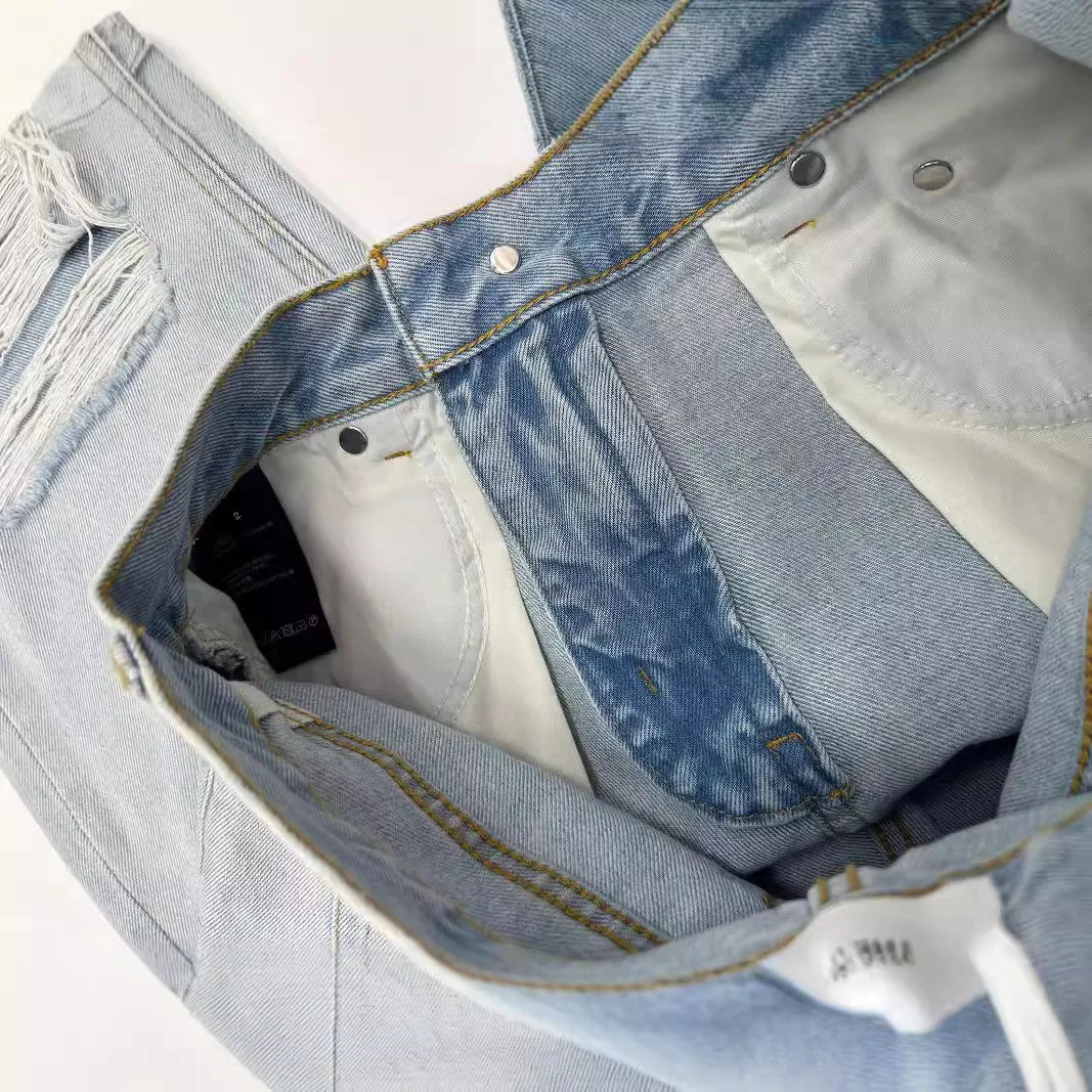 Jeans a gamba dritta strappati con foro da donna pantaloni larghi in denim alla moda a vita alta