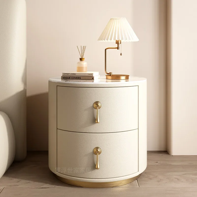 Light luxury bedside table Round modern simple small bedside table Bedroom advanced rock slab solid wood leather bedside table