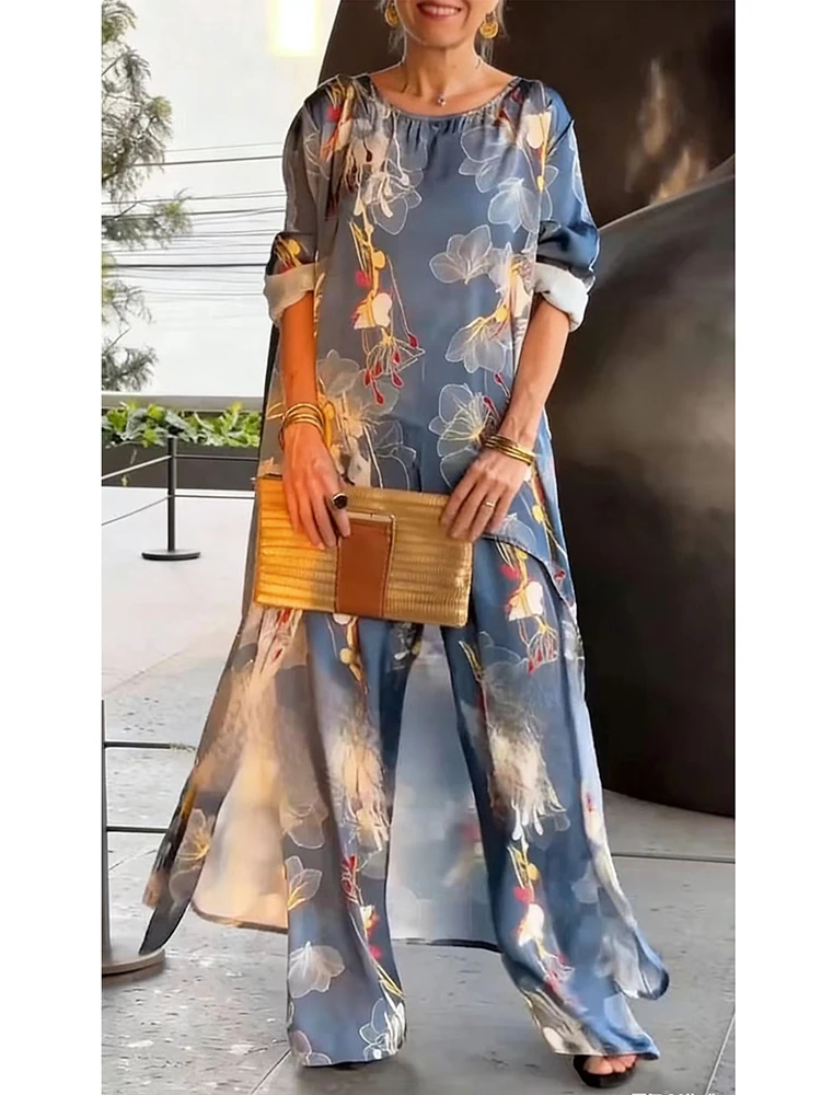

Spring and Autumn women's long sleeved casual style polyester material 2026 new fashionable round neck printed loose pants set