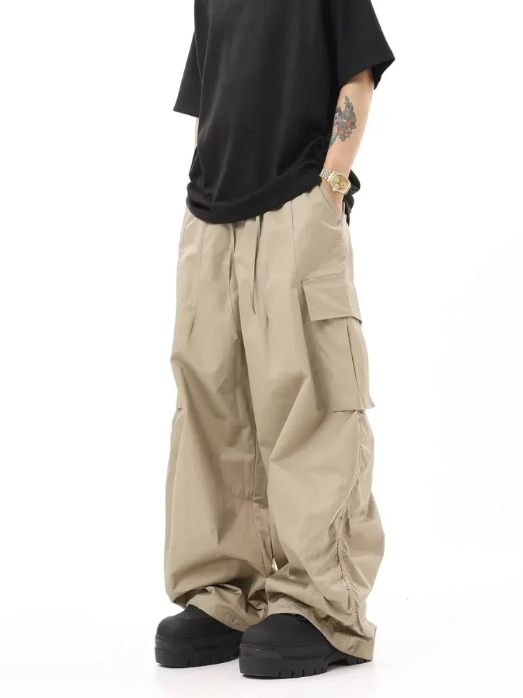 Pantalones Cargo sueltos de Hip-hop para hombre, ropa de calle de moda con cordón, pierna ancha, pantalones casuales de paracaidista arrastrados, Retro, High Street, nuevo