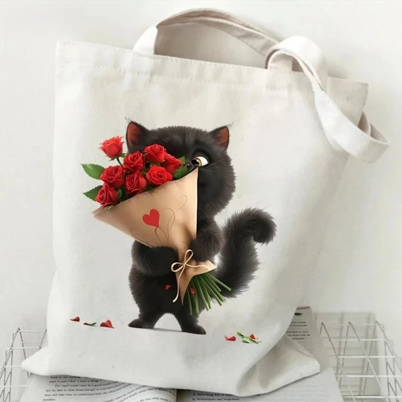 

Black cat and floral pattern handbag - Women's cartoon animal canvas bag - Funny cat lover's shopping handbag 2026