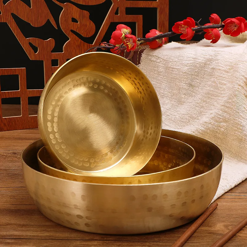 

Thickened brass bowls Chinese style Buddha offering bowls are placed in copper utensils and vegetable