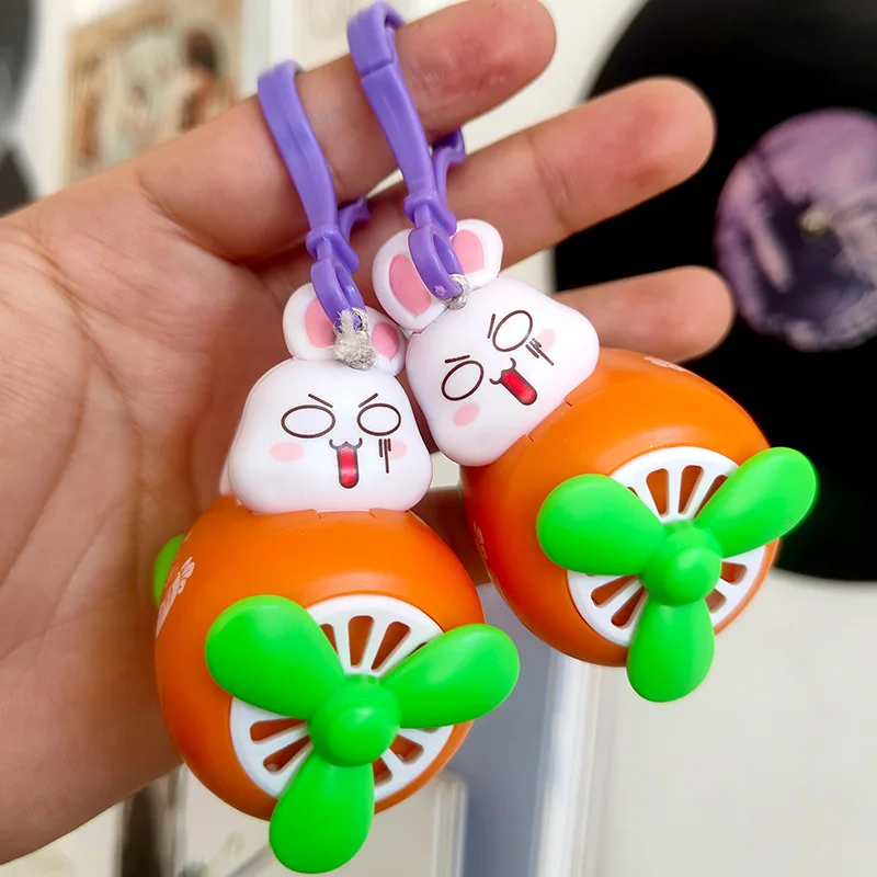 

Novelty Funny Cartoon Cute Carrot Rabbit Pull String Flying Toys Keychain Pendant Children's Stress Relief Toys Backpack Pendant