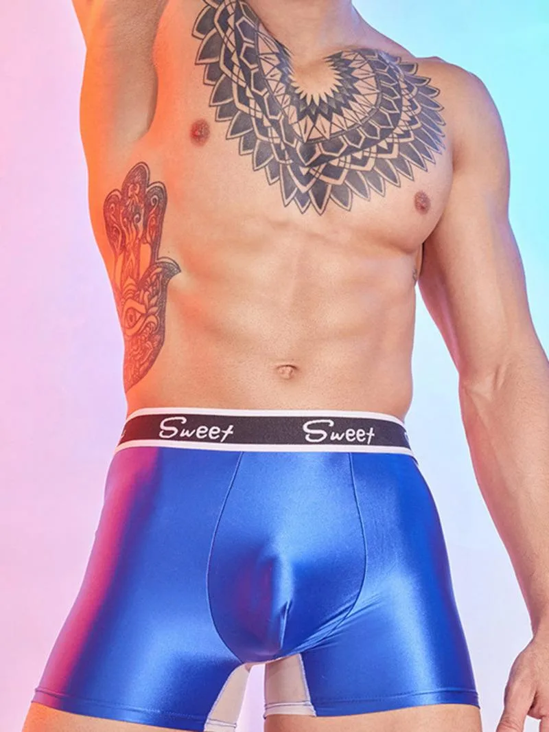 

Модные мужские тонкие трусы с блестящими гладкими мышцами, мужские сексуальные шорты для пляжного отдыха, праздничного стиля, с буквенным принтом, сплошной цвет, LL1G