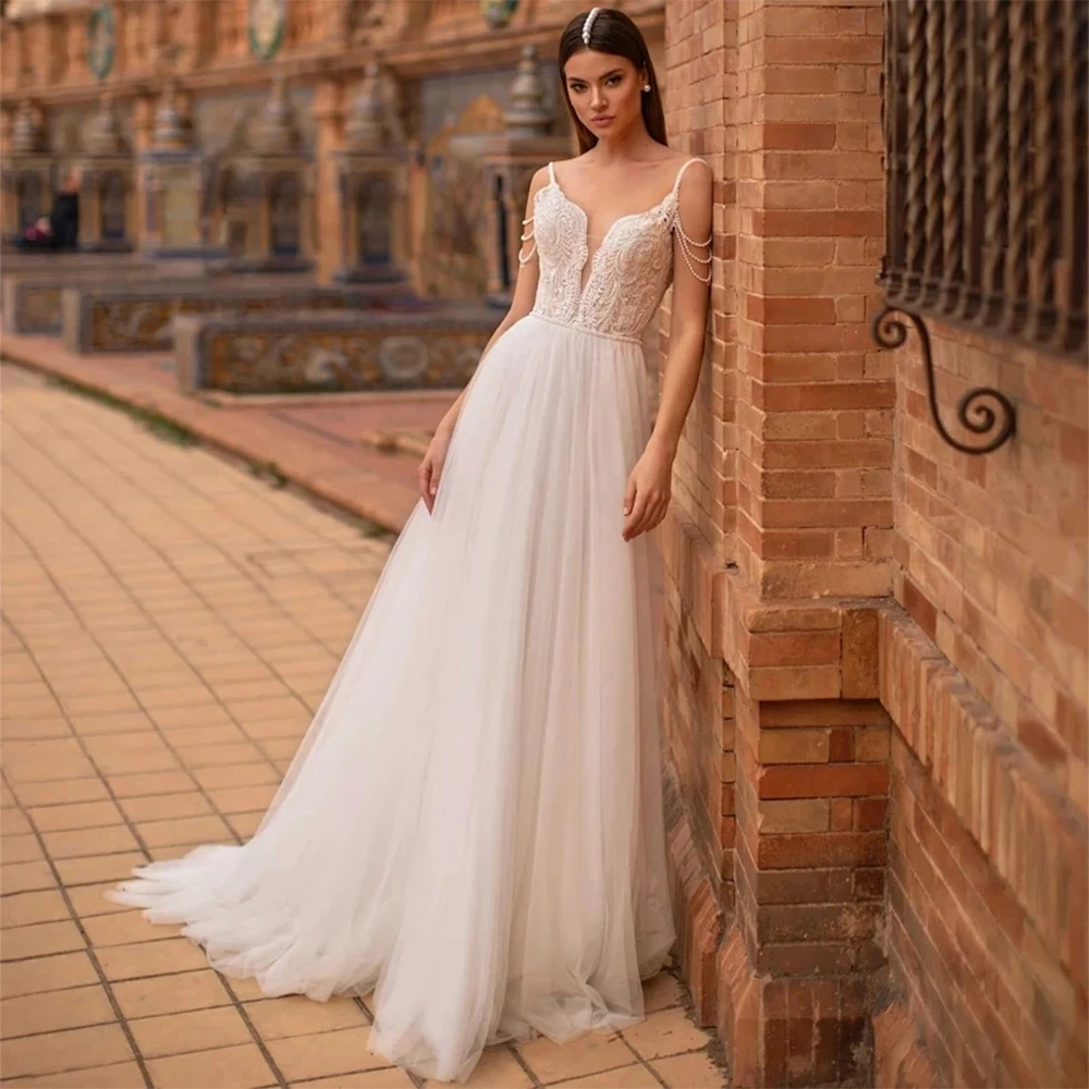 Elegant A-line Backless Wedding Dress 2023 Lace Embroidered Pearl Suspenders White Tulle Buttons Beaded Floor-Length Bridal Gown