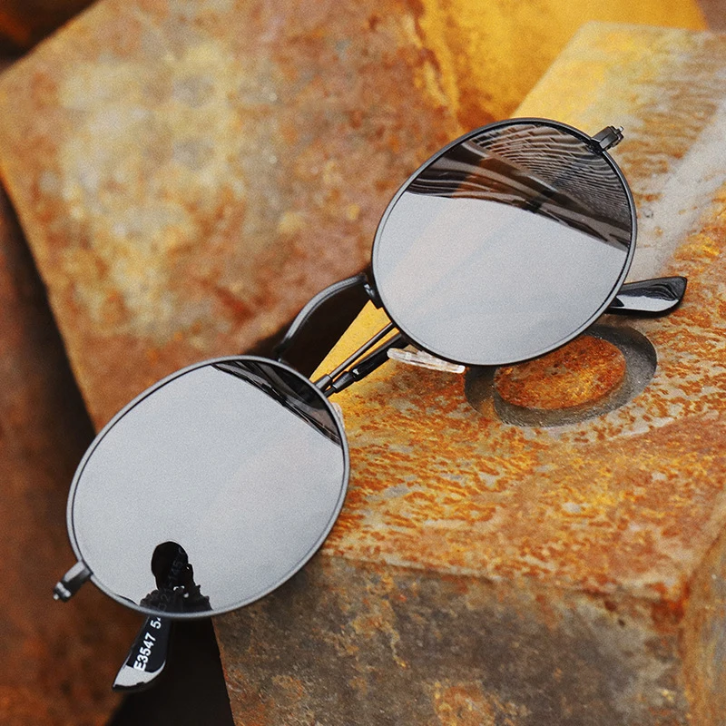 The new metal oval glasses classic retro sunglasses polarized sunglasses couples