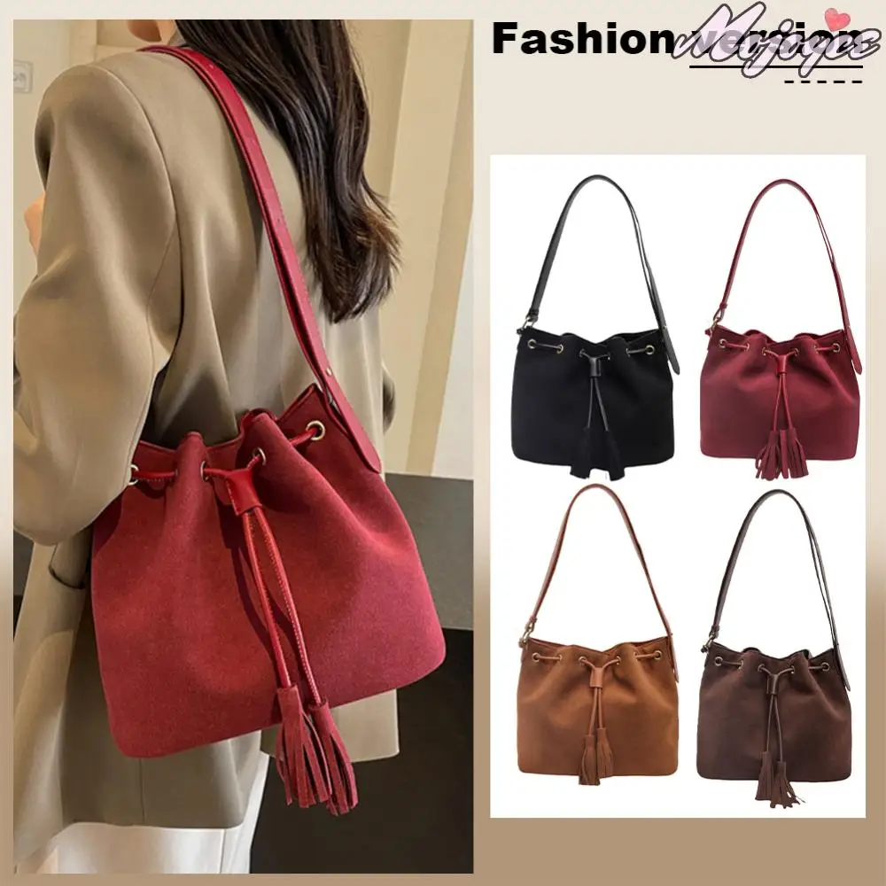 

Women Suede Shoulder Bag with Tassel Retro Handbag Adjustable Strap Hobo Bag Solid Color Tote Purse for Work Travel