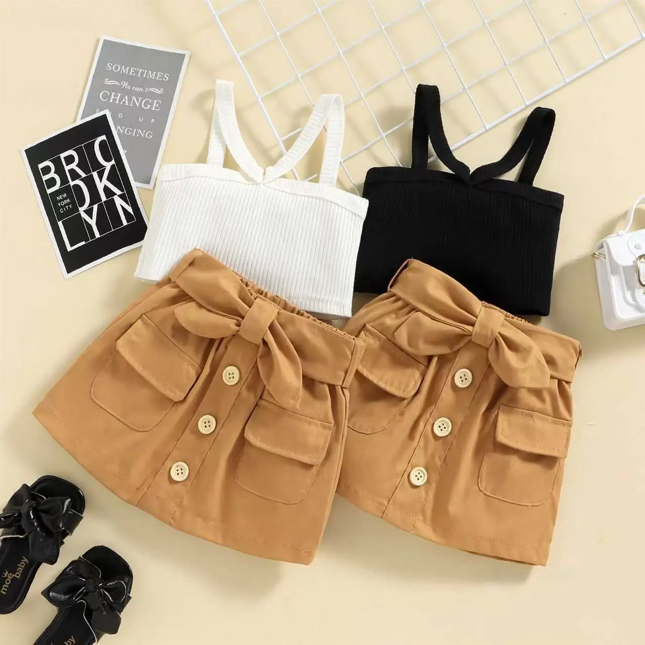 

2025 New Summer Children's Clothing Ins New Suspender Top Bow Short Skirt Two-piece Suit Girls Clothing Set