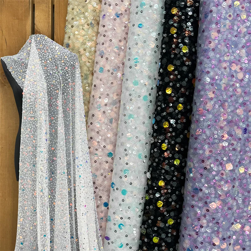 

French luxury netted lace children's dress,wedding dress and performance dress,sewn with African sequined lace embroidery fabric