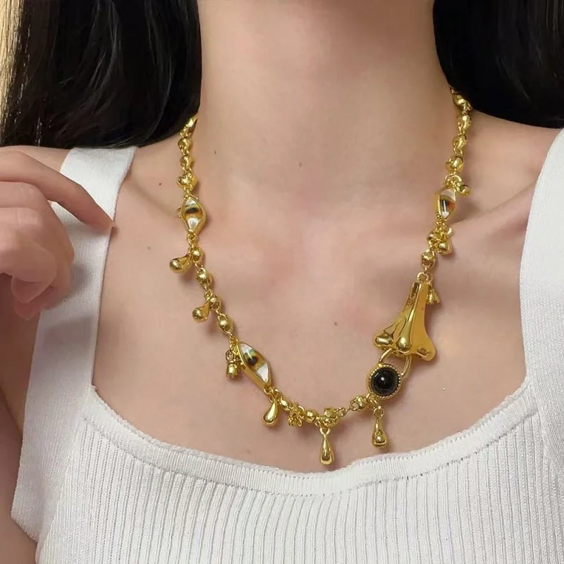 

Fashionable European Style Metal Necklace for Women with Irregular Waterdrop Devil's Eye Black Agate Pendant Exaggerated Clavicl