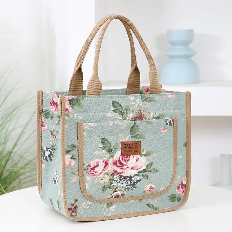 New floralPrint CanvasToteBagWithThickened MaterialTote bag.  Features A Zipper closure,front Pocket, as a Handbag Lunch box bag