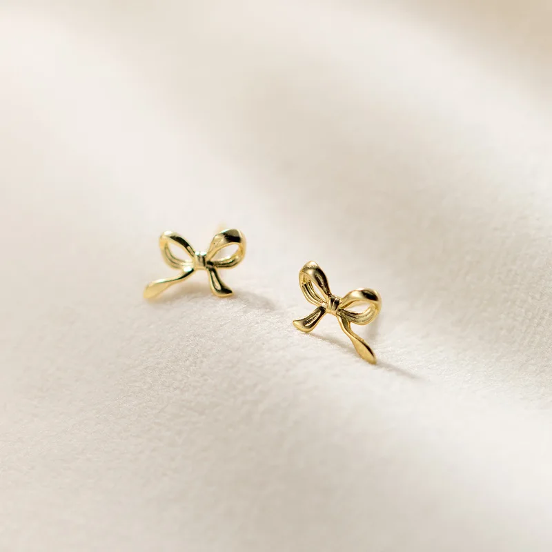 Pendientes de botón con lazo para mujer, Piercing de oreja minimalista Simple, Color dorado y plateado, regalos de joyería